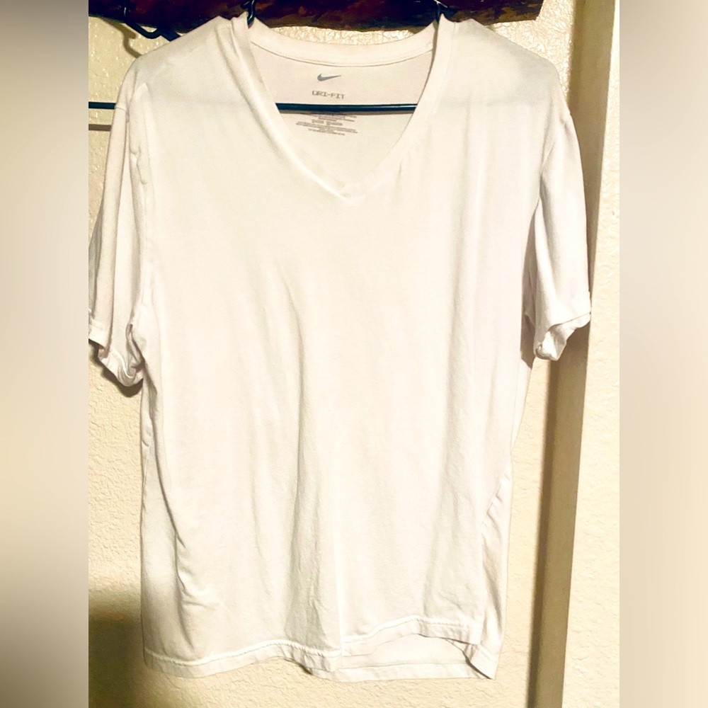 Nike dri-fit v neck tee shirt. Size XL but fits more like a large. Like new!